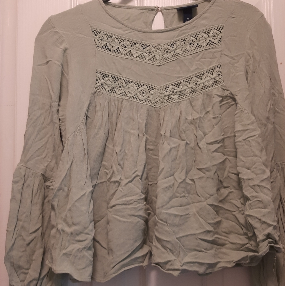 Light green peasant blouse.